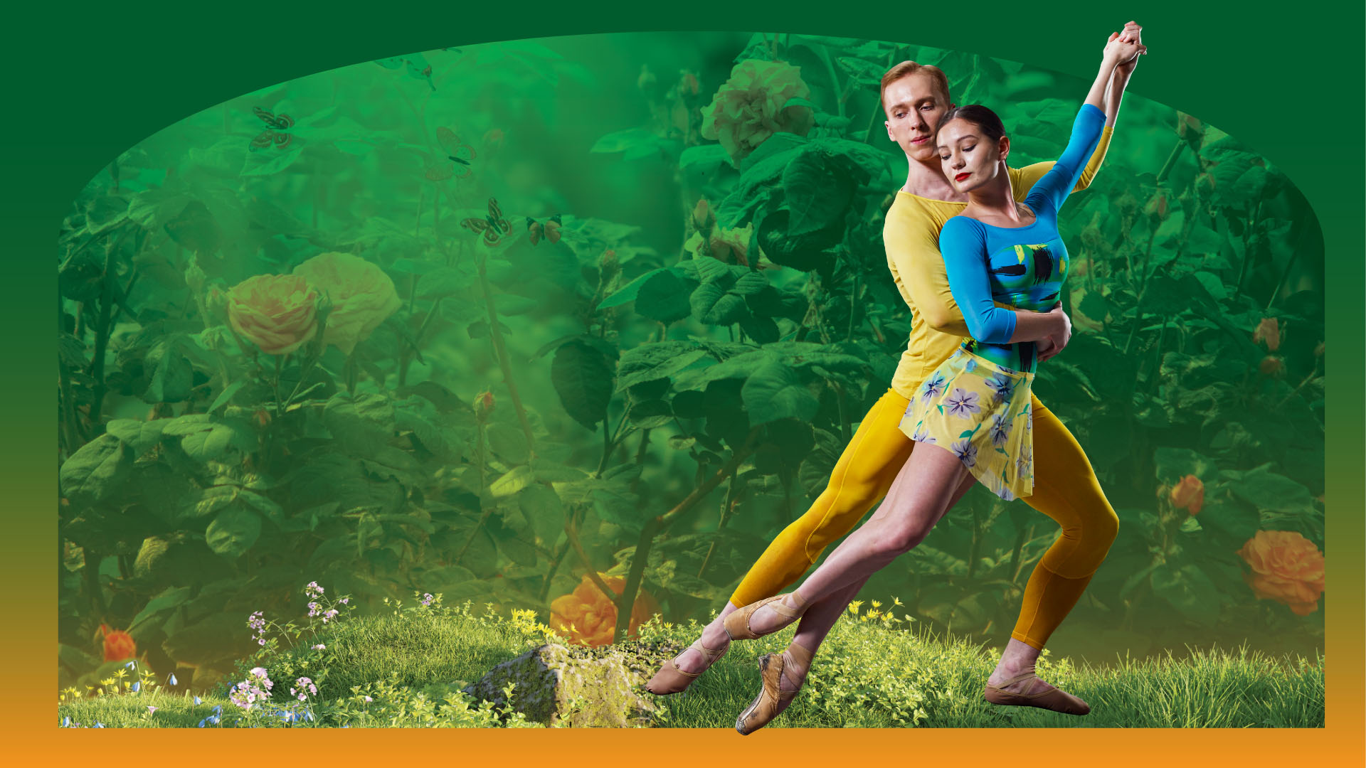 A white blonde male dancer in yellow tight clothing holds another dancer with medium complexion and dark hair wearing a blue longsleeve shirt and yellow skirt.