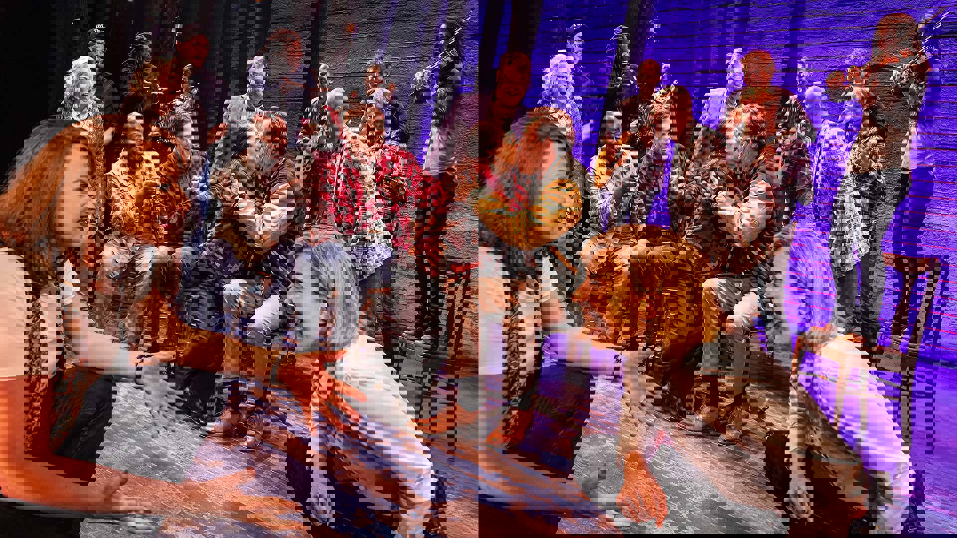 The cast of Come from Away performing on stage