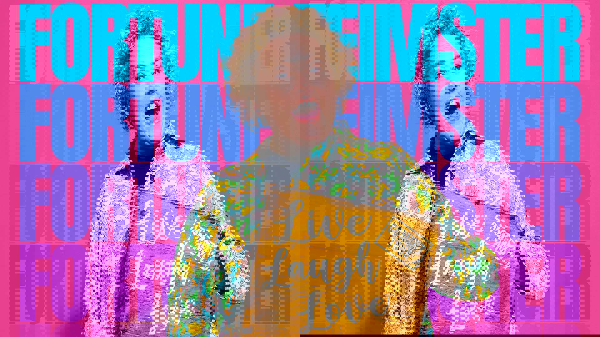 A woman with light complexion and medium length curly blond hair and a colorful collared shirt holding a wooden sign that says "Live, Laugh Love Comedy Tour". The background is pink with large stacked blue letters spelling out "Fortune Feimster"