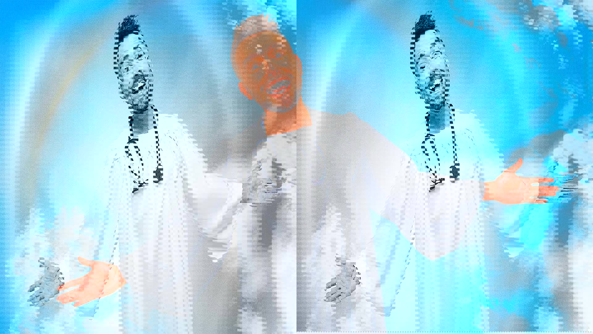 A smiling white man with a beard, short styled brown hair and a white robe smiles with open arms towards the viewer. There is a stethoscope arround his neck and the background is a sunny sky with a few clouds.