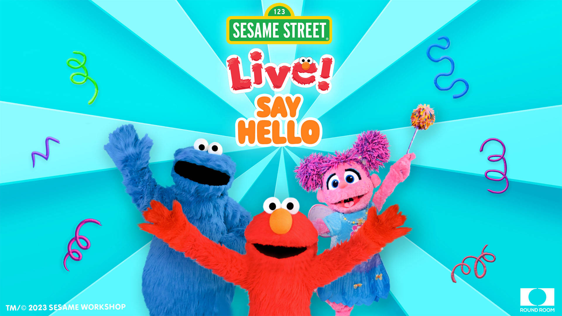 Light blue banner that reads: "Sesame Street Live! Say Hello." Three puppets, blue Cookie Monster, red Elmo and pink Abby Cadabby are featured at the center with confetti.