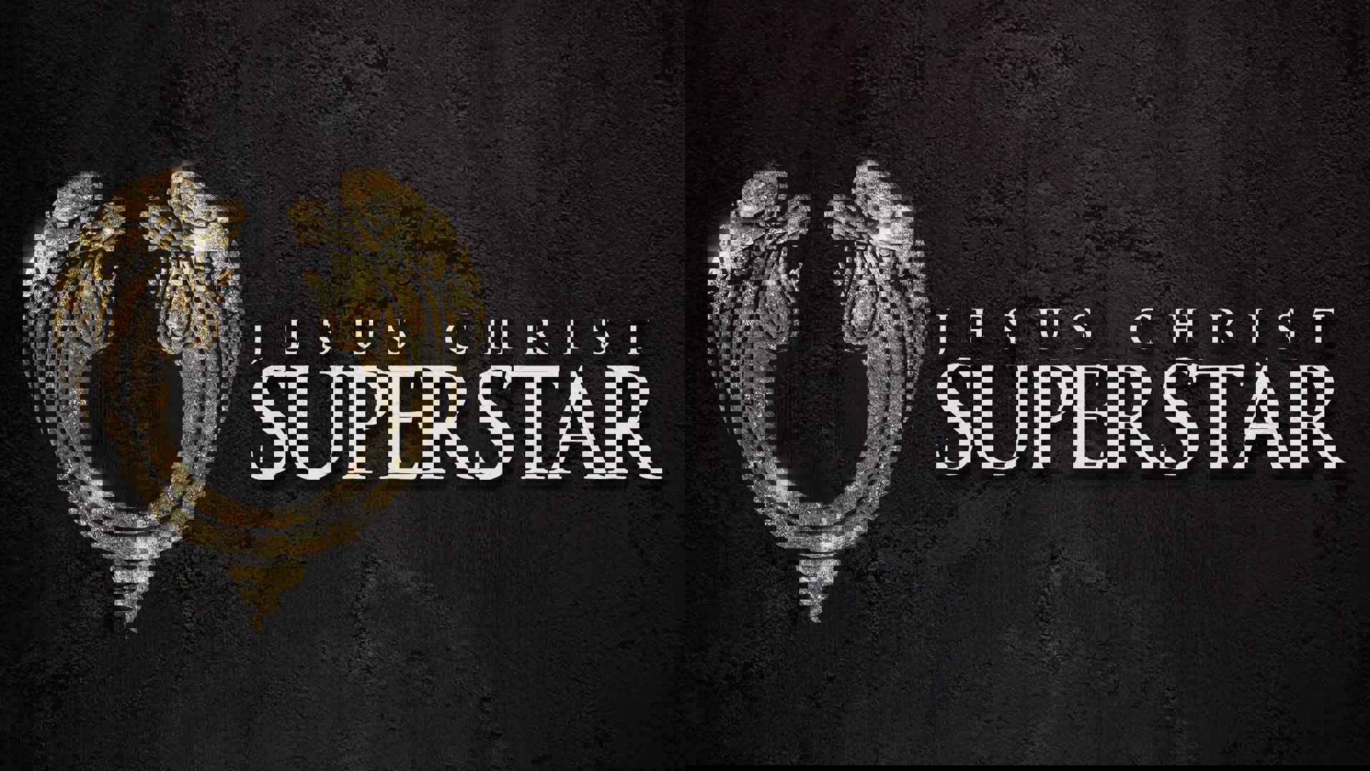 Jesus Christ Superstar key art. The title is over a dark grey wall. A gold decoration is to the left of the title that incorporates two angels praying.