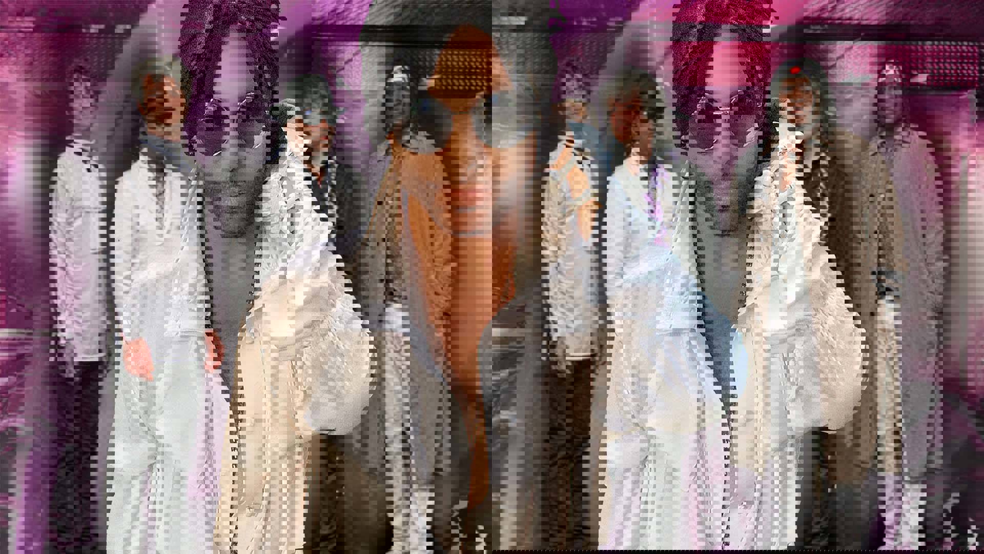 Marshall Charloff is dressed to look just like Prince - a flowing white top, sunglasses and black bandanna on his head. Behind him, four bandmates are wearing similar outfits.