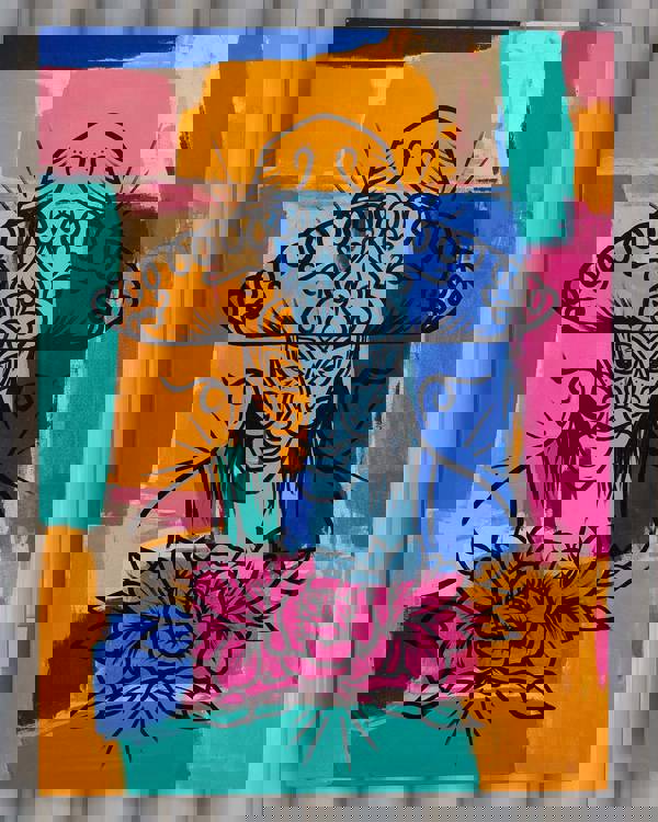 A colorful painting portraying a flowers and a person wearing a sombrero and a mask.