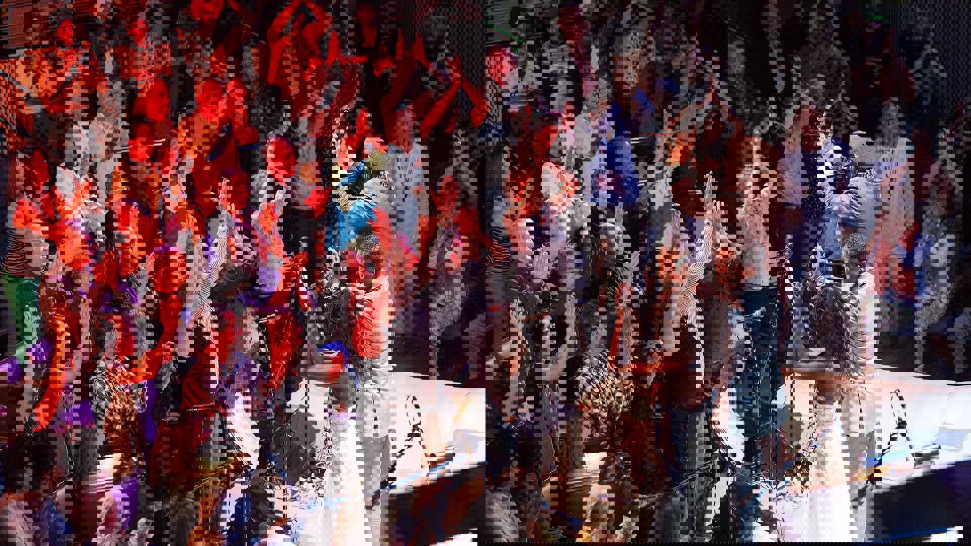 The Afro-Cuban Allstars performing to a clapping crowd