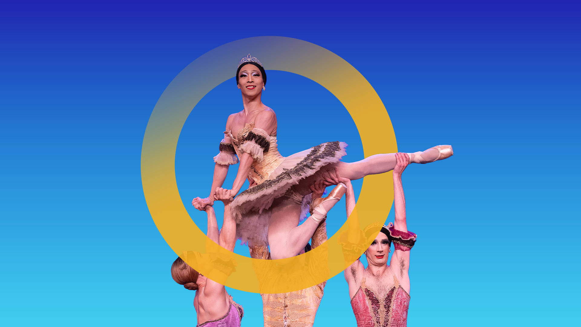 Three ballerinas with light complexion lifting up another with medium complexion. All are wearing ornate pink and tan tutus. A yellow "O" is placed around them with a gradient blue background.