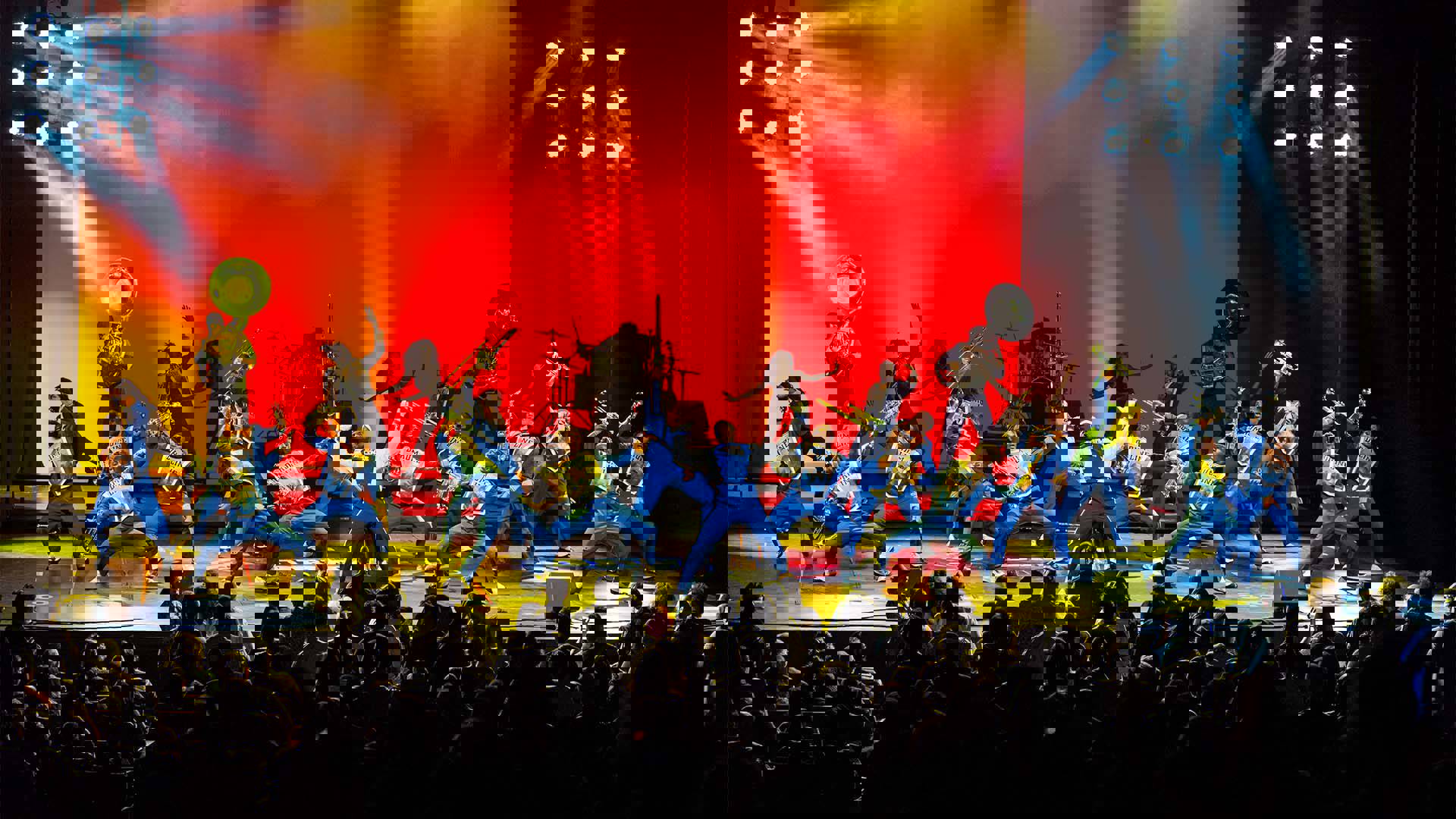 Drumline Live's African-American marching band performing on stage.
