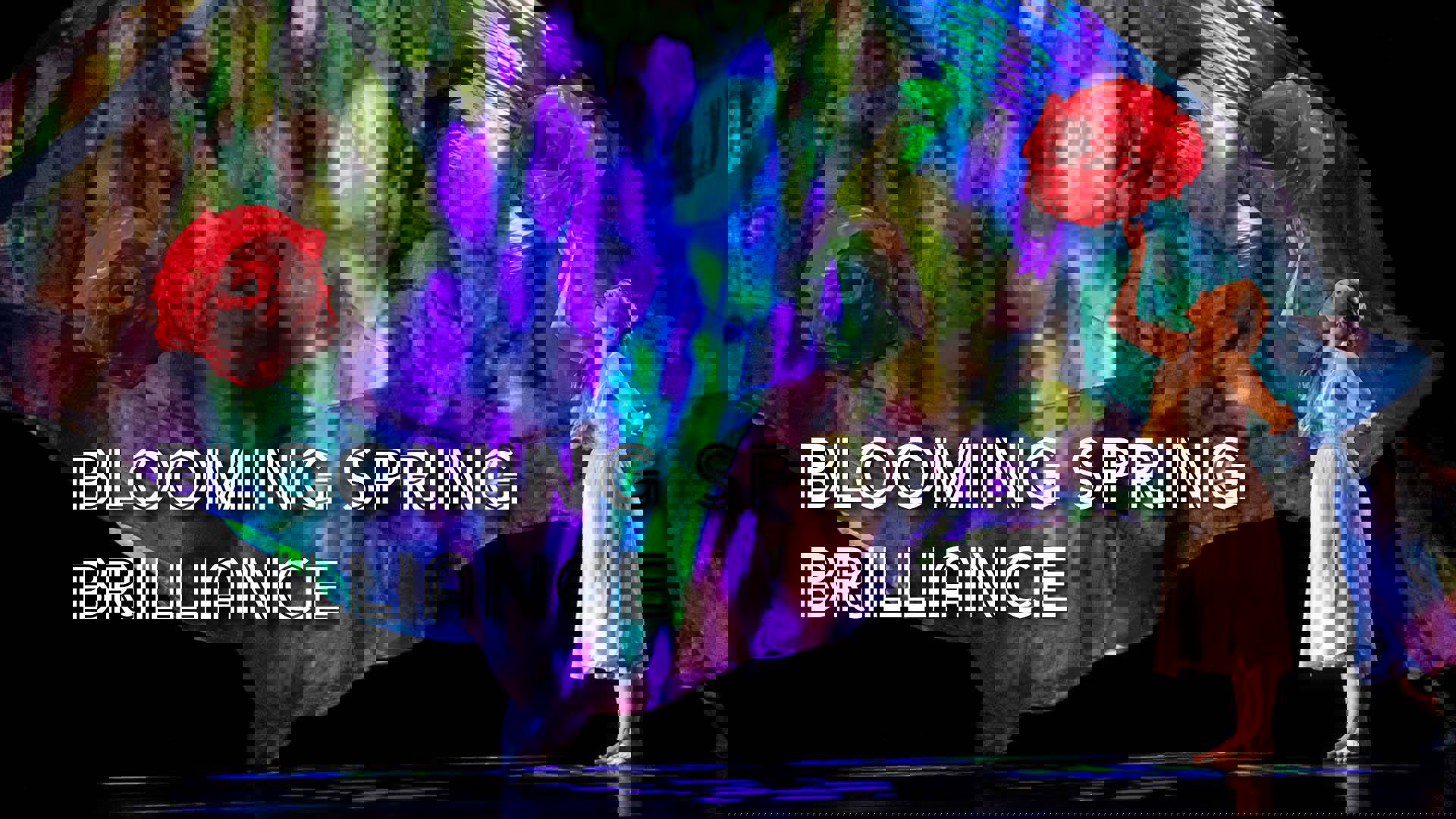 Banner reads: "Blooming Spring Brilliance." A caucasian woman in a simple, white knee-length dress with long blonde hair has her right arm reaching up and touching a large rose. A multicolored green and purple fabric billows in the background.