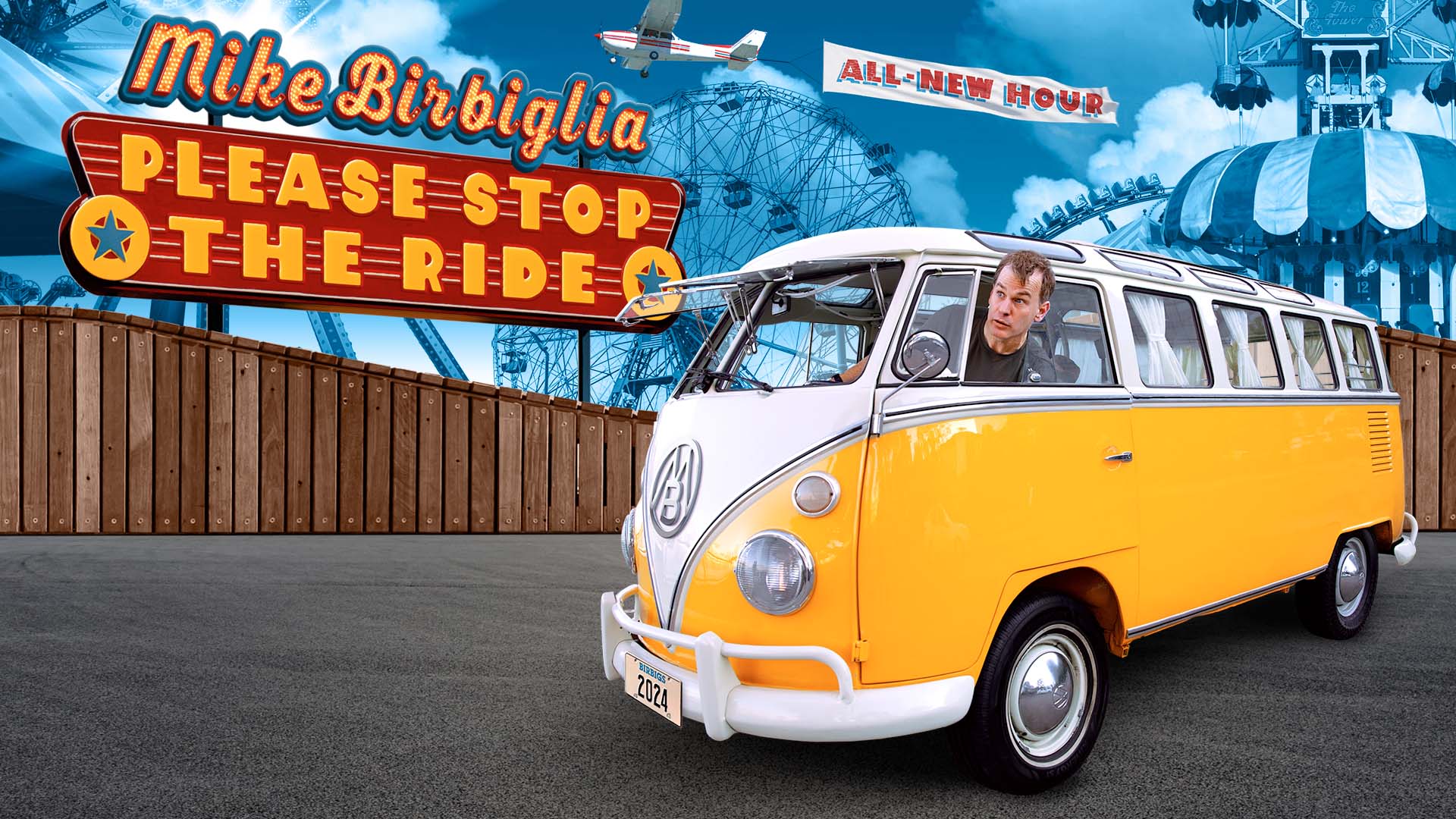 Banner text reads: "Mike Birbiglia Please Stop the Ride. All New Hour". Birbiglia, a middle aged white man with short brown hair sticks his head out of a yellow vintage Volkswagen bus. In the background there are a variety of carnival rides in a blue hue.