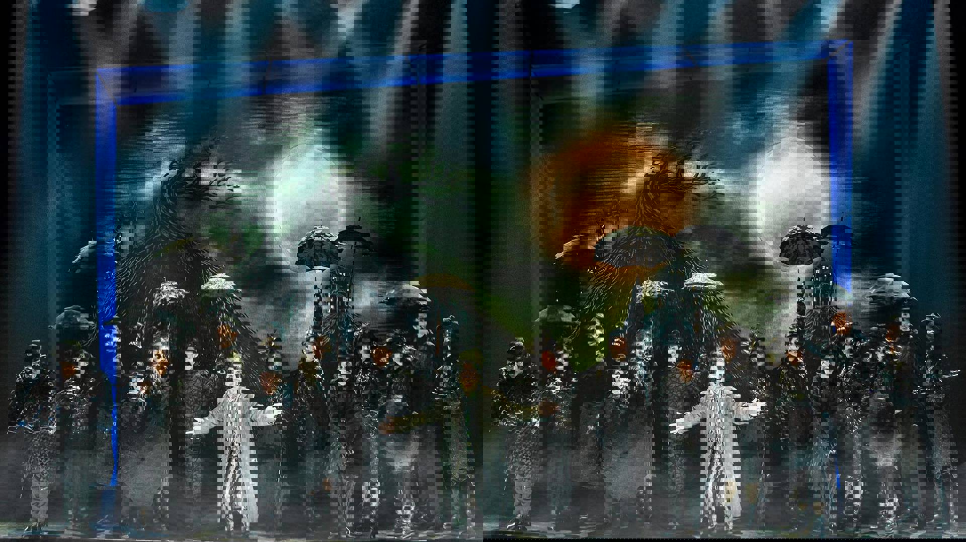 The cast of Beetlejuice performing on stage.