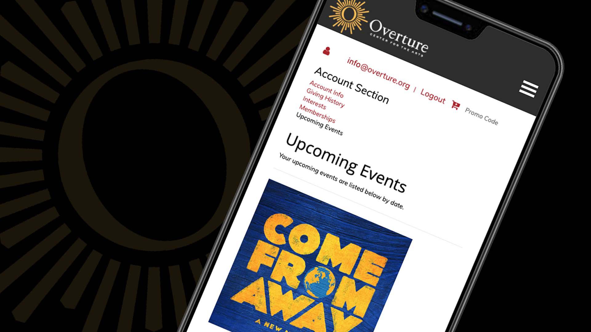 A smart phone showing mobile tickets for Come From Away on the Overture website.