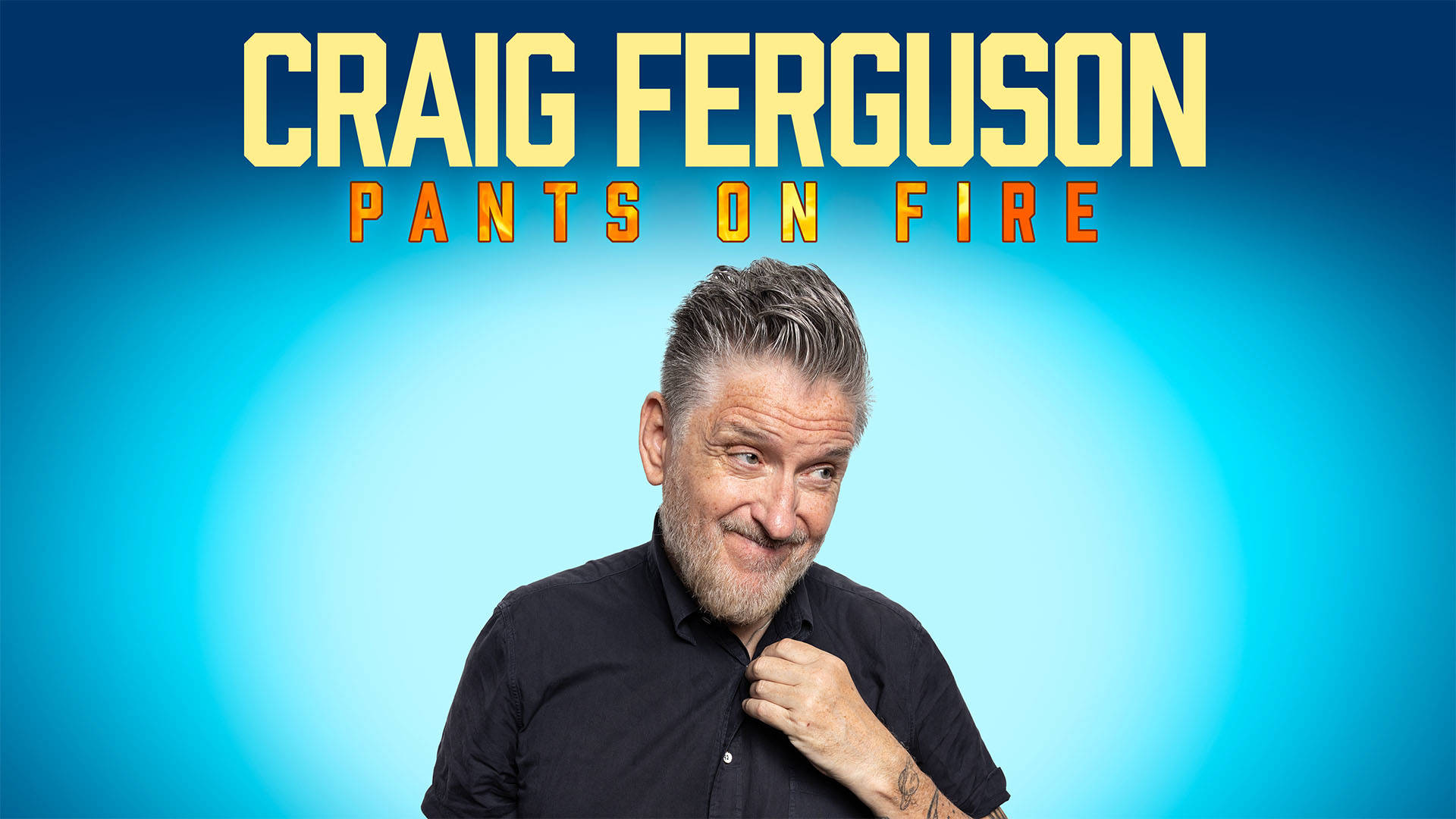 Blue banner reads: "Craig Ferguson: Pants on Fire" in yellow and orange blocky font. Image of Craig, an older white man with short grey hair and beard wearing a black button up shirt.