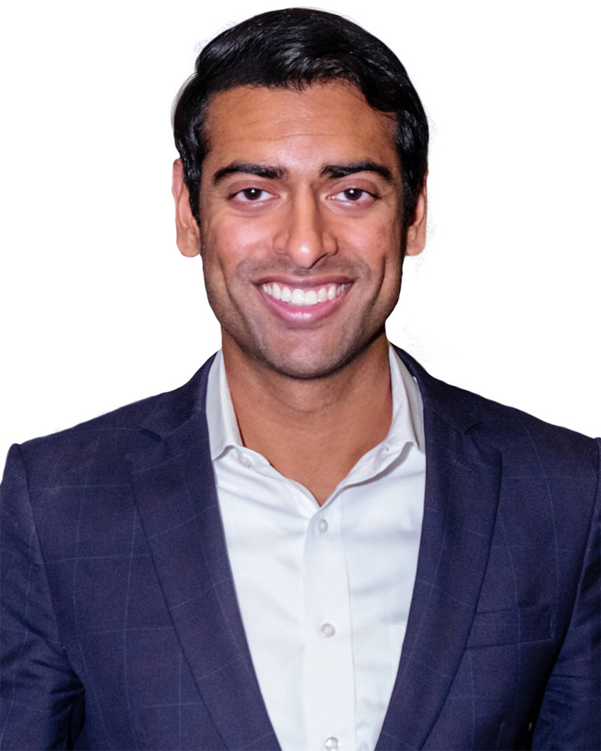 A young man with medium complexion, short dark hair and brown eyes in a blue suit jacket.