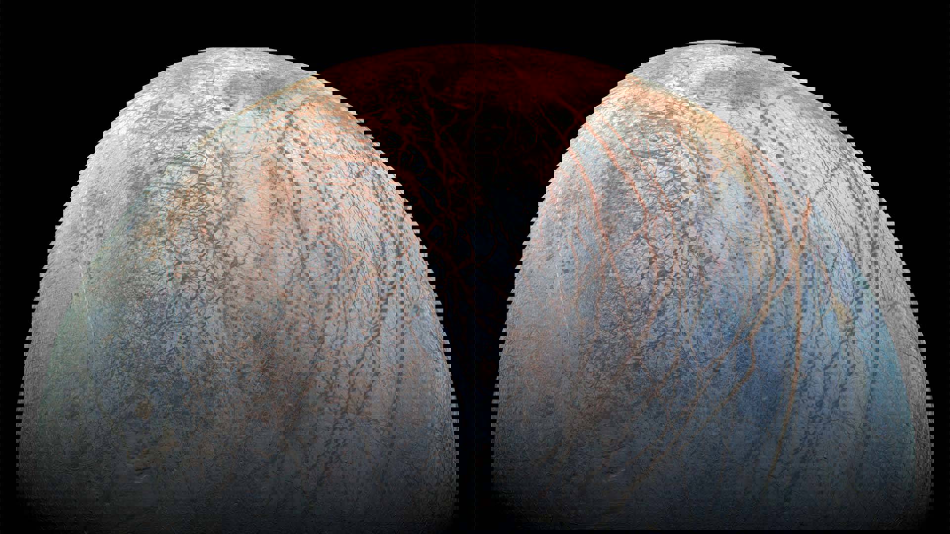 A view of the moon Europa Moon. It is white with copper streaks.