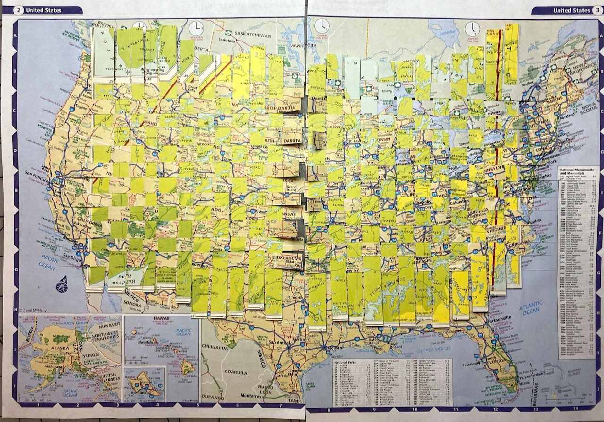 A treated united states map with many paper flaps.