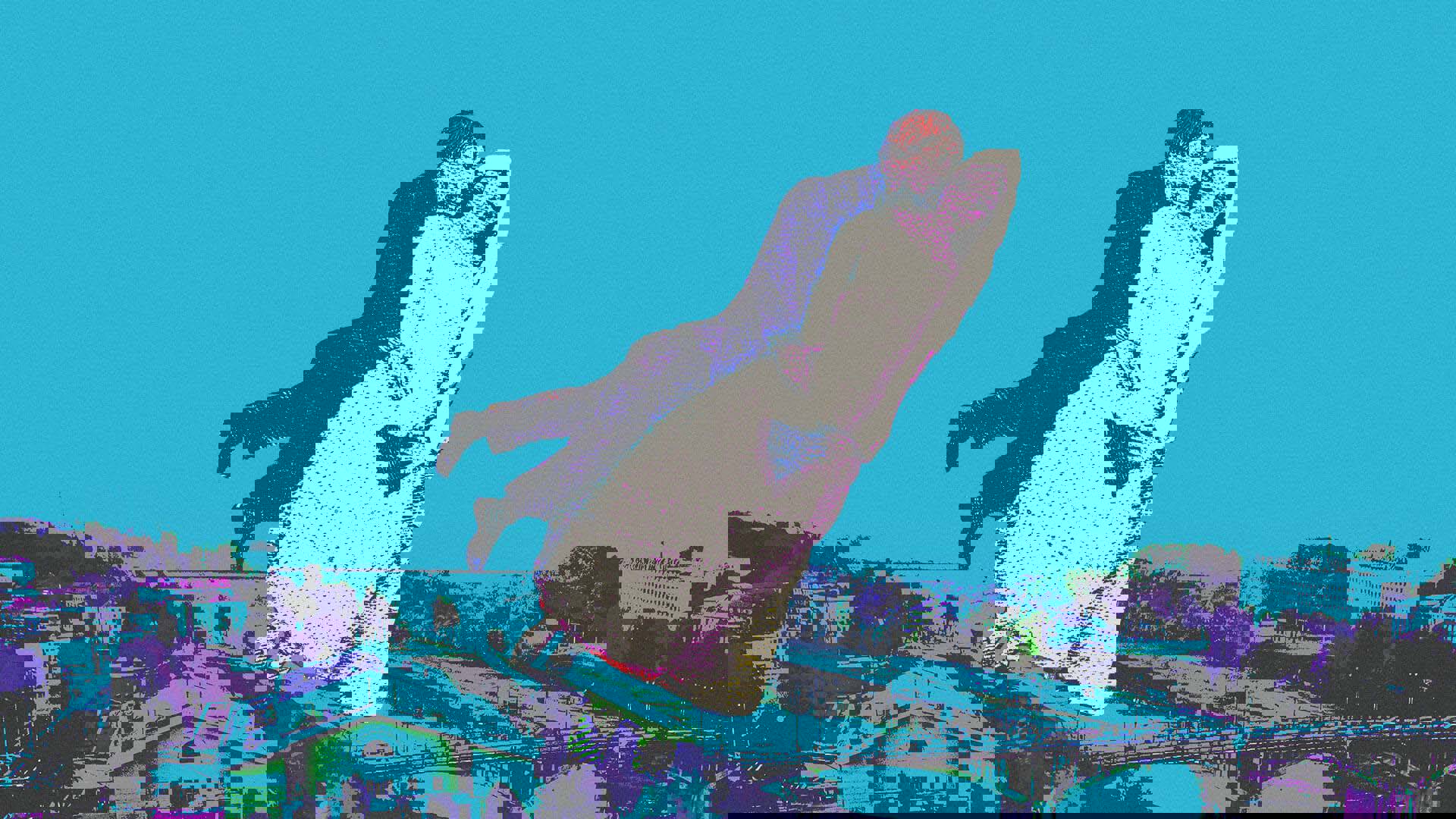 Blue banner with cartoonish images of a bride and groom flying over a town.