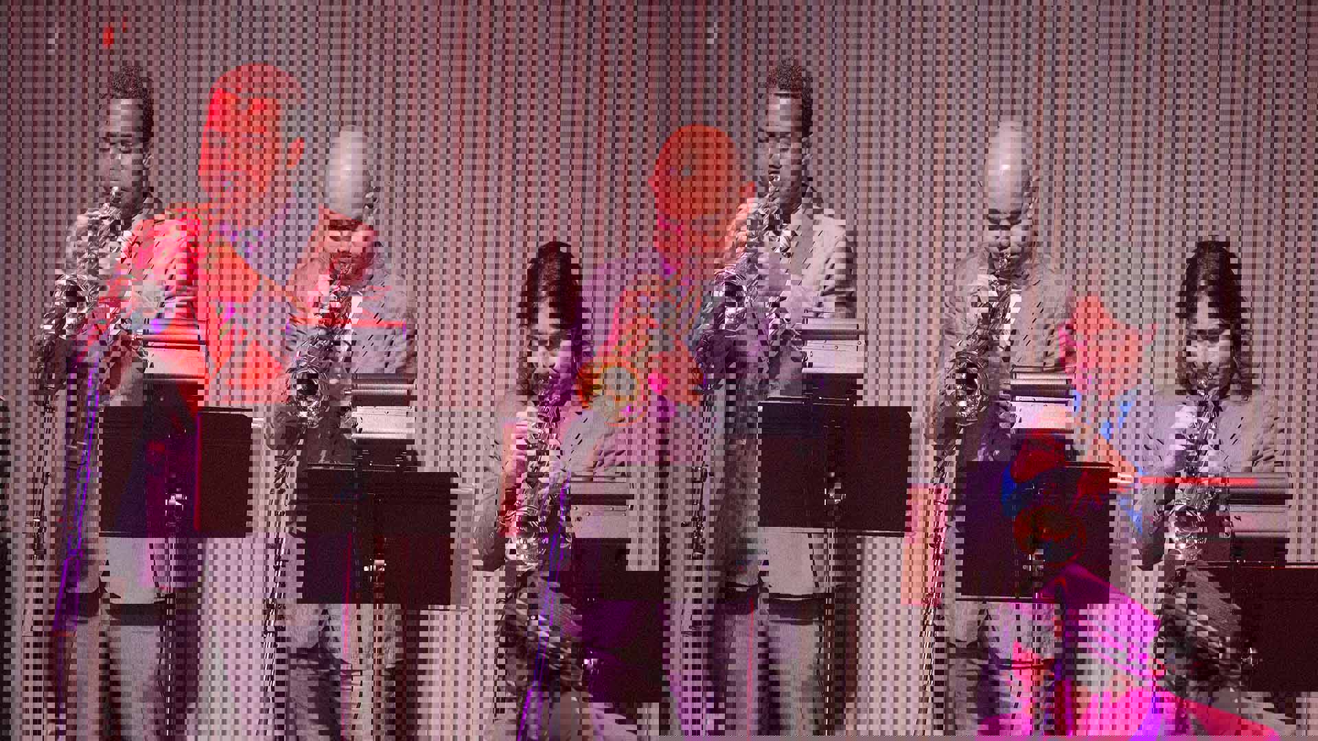 The trumpet section of the Afro-Cuban Allstars performing.