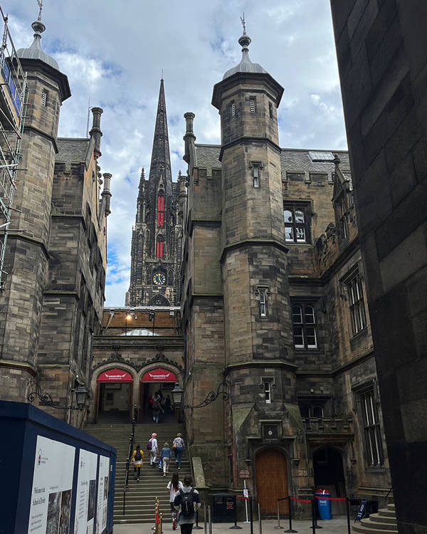 A castle-like brick facade and staircase.