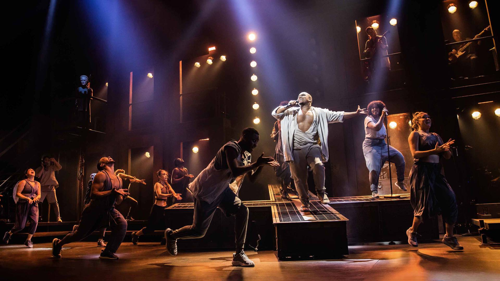 The cast of Jesus Christ Superstar performing on stage.