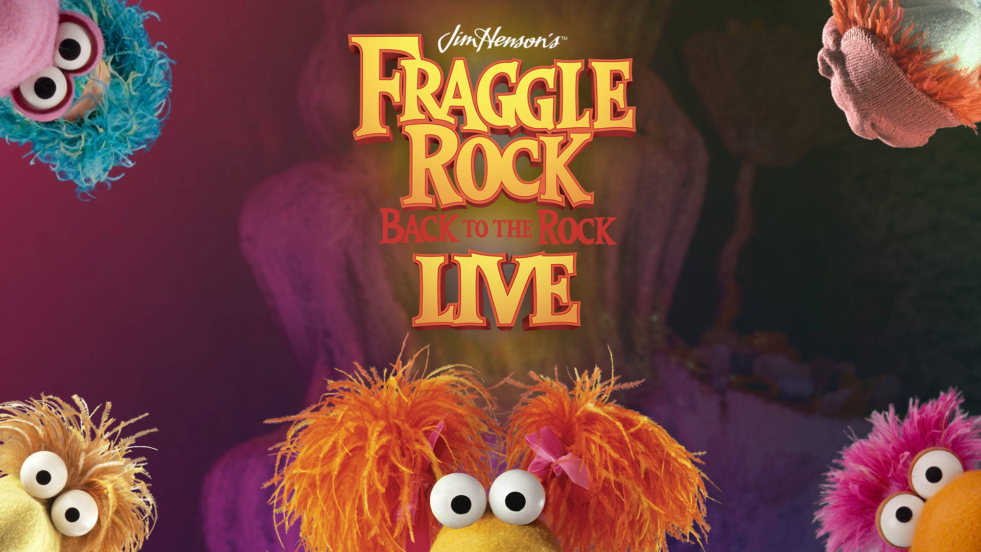 Banner text reads: "Jim Henson's Fraggle Rock Back to the Rock Live. Five puppets with colorful poofy messy hair and large white eyes with black pupils are poking their heads out from the edges of the banner.
