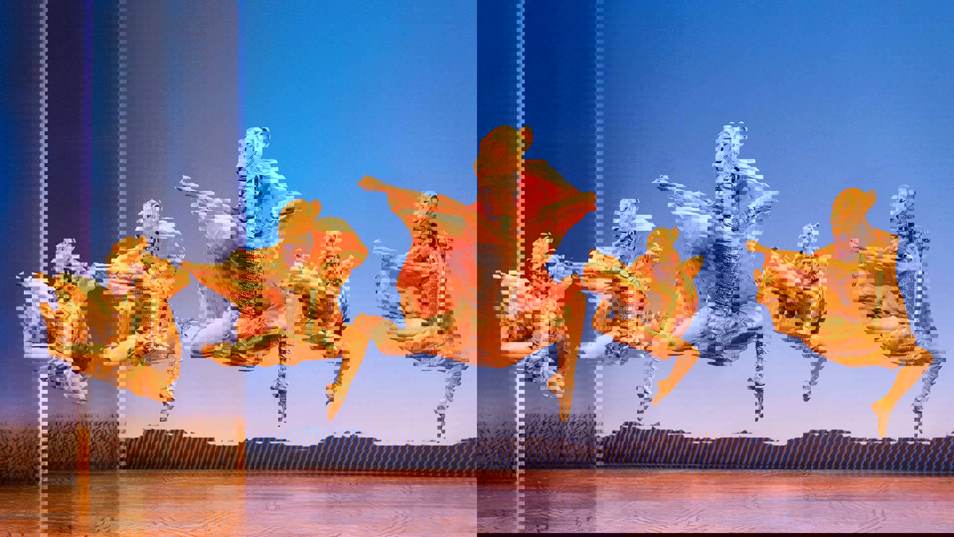 Actors dress as Lionesses leap into the air in sync