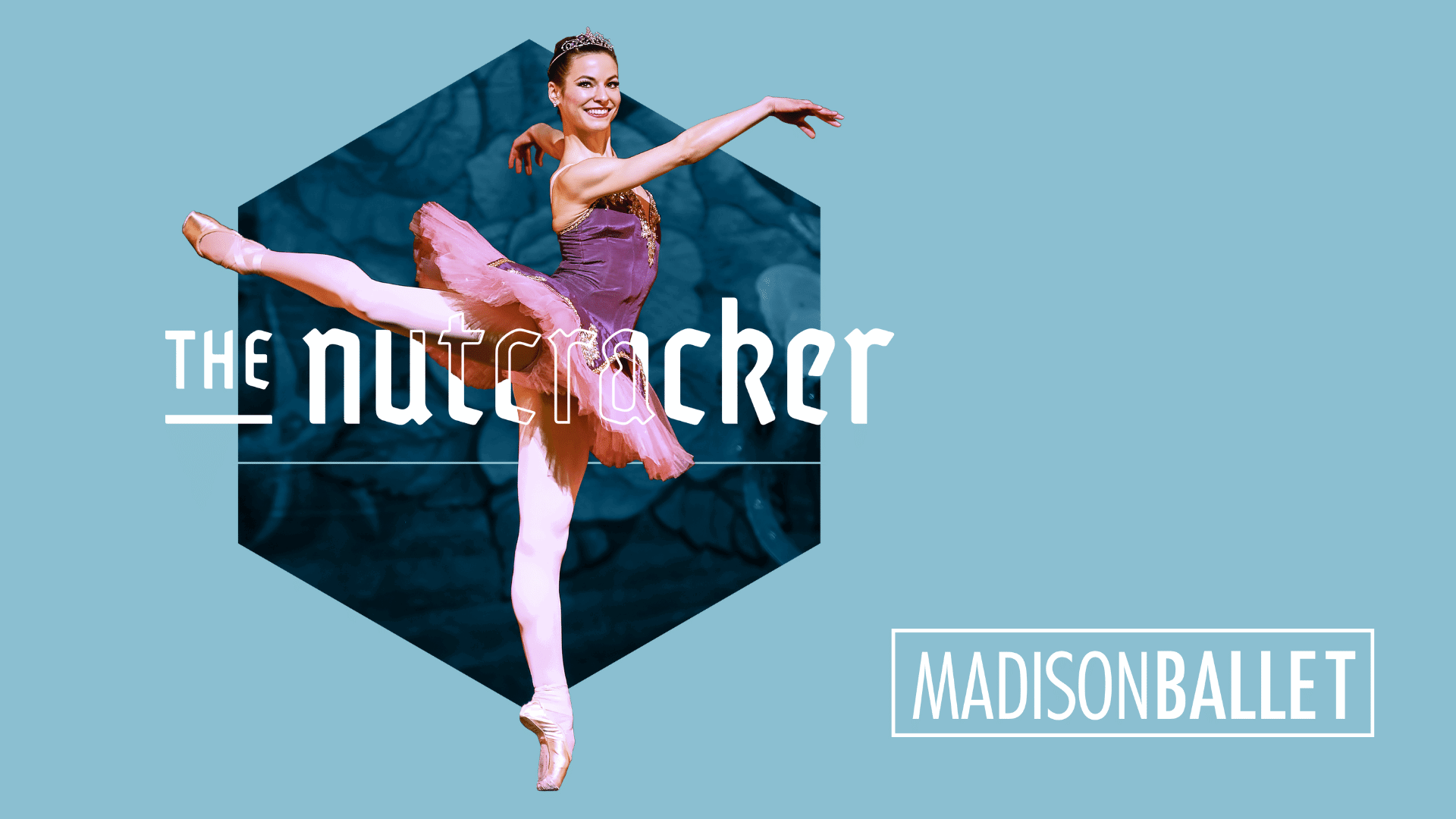 Madison Ballet Nutcracker Banner. It is blue with a ballerina in a pink and purple leotard and tutue balancing on one foot's toes with her other limbs extended