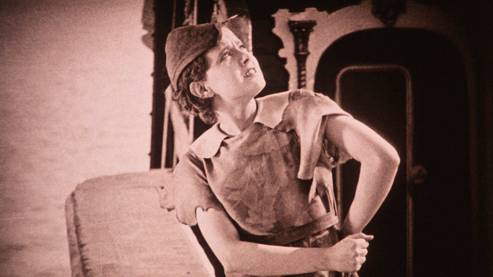 Peter Pan (played by Betty Bronson) looks to the sky in a scene from "Peter Pan (1924)."