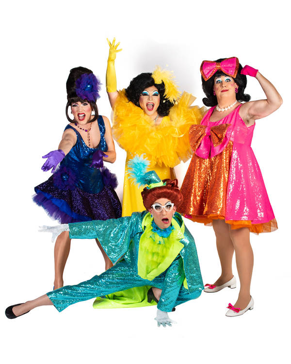 The Kinsey Sicks - four drag performers posing together in bright, colorful sequined formal outfits with ruffles, feathers and bows.
