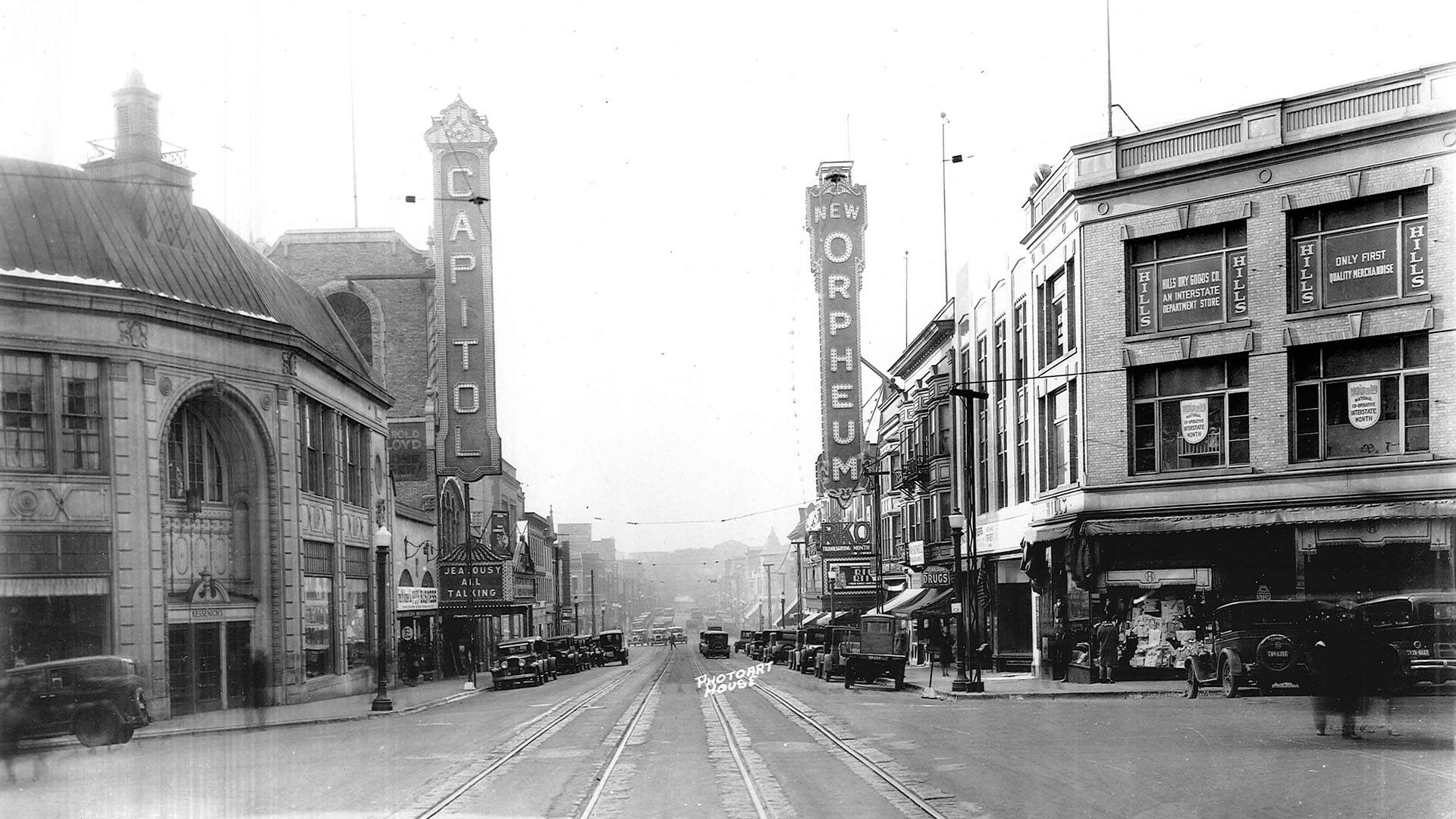 Historical photo of state street in black and white, including the marquees of Capitol theater and The Orpheum.