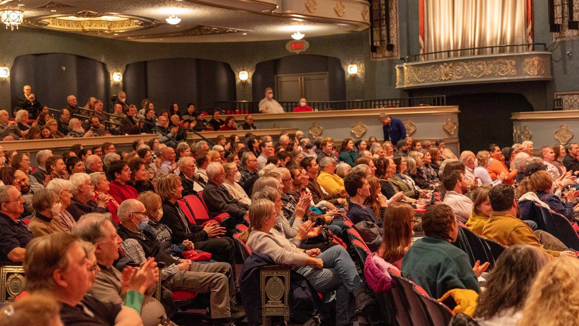 A seated crowd in Capitol Theater.