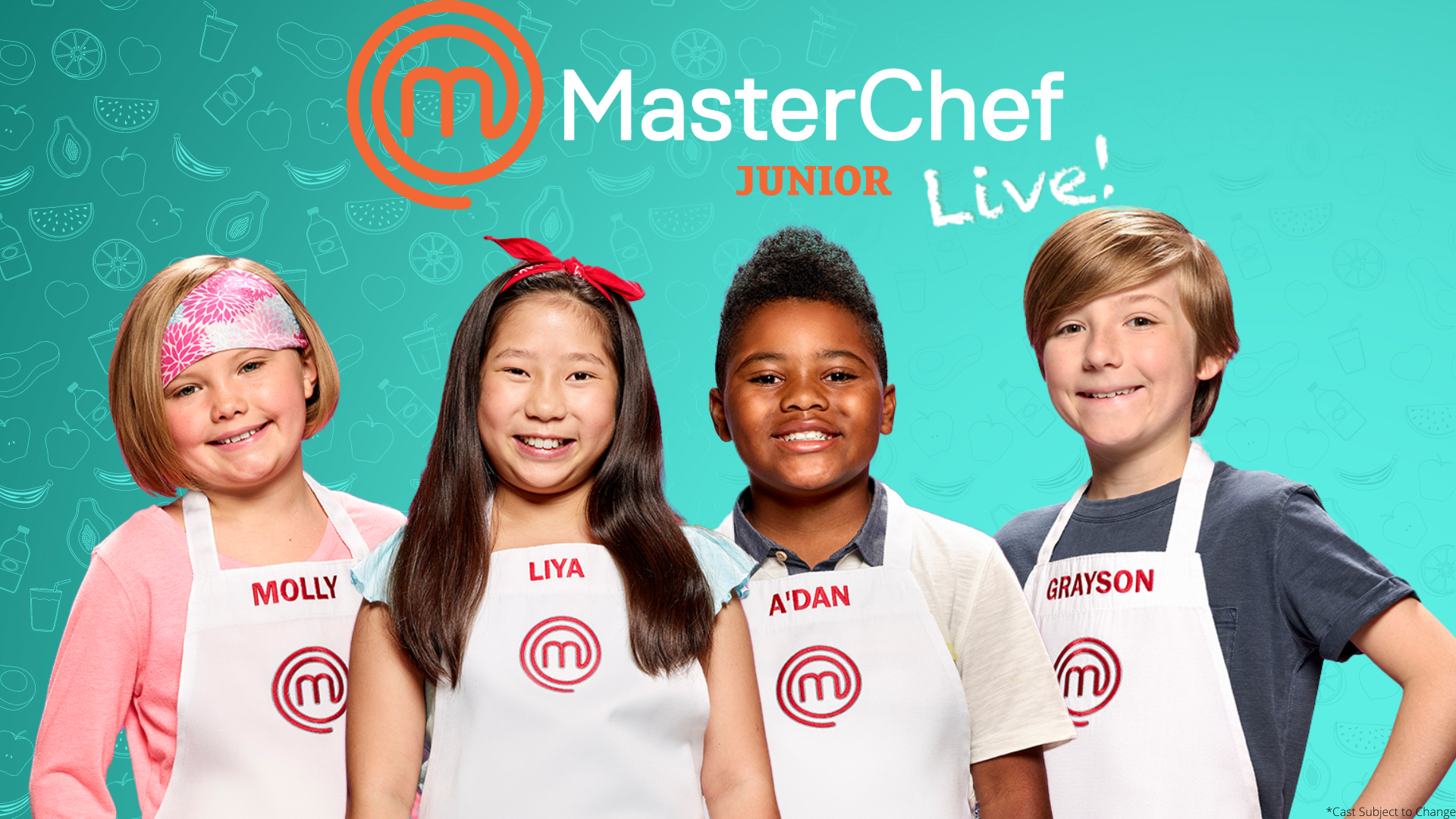 Four children in chef's aprons smiling to the viewer.